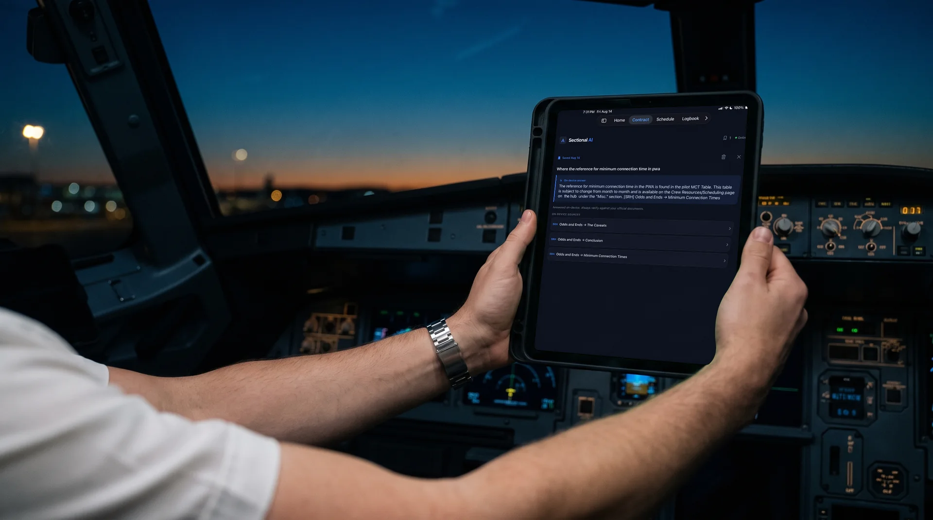 Sectional AI on an iPad in a parked flight deck at dusk, showing a contract question answered with cited sections